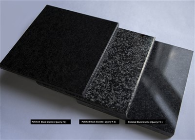 Tummanharmaat graniittitopit