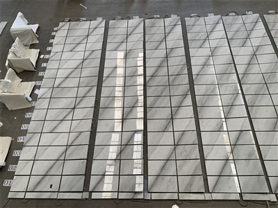 Valkoiset marmorilattialaatat 600x600