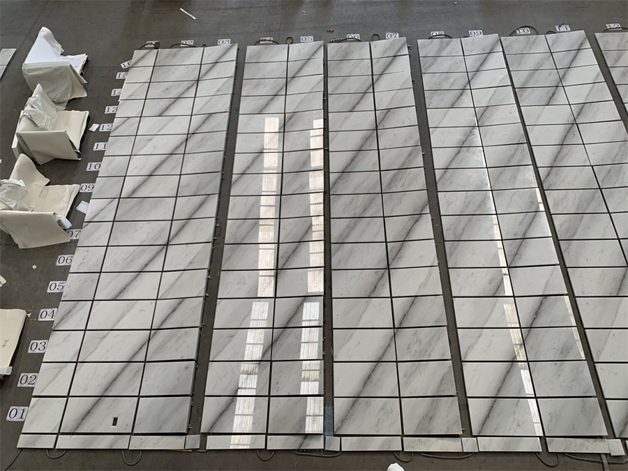 Valkoiset marmorilattialaatat 600x600